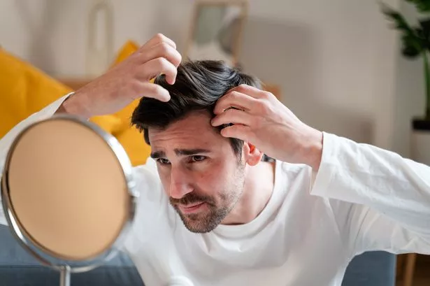 18 Low Maintenance Haircuts for Men Over 50: Timeless Style Meets Effortless Grooming 19 0 GettyImages 1897008621