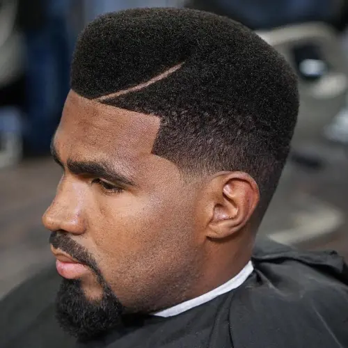 13 Afro Fade Variations: A Stylish Evolution of Black Men’s Hair 10 14 vintage high top taper with a shaved line