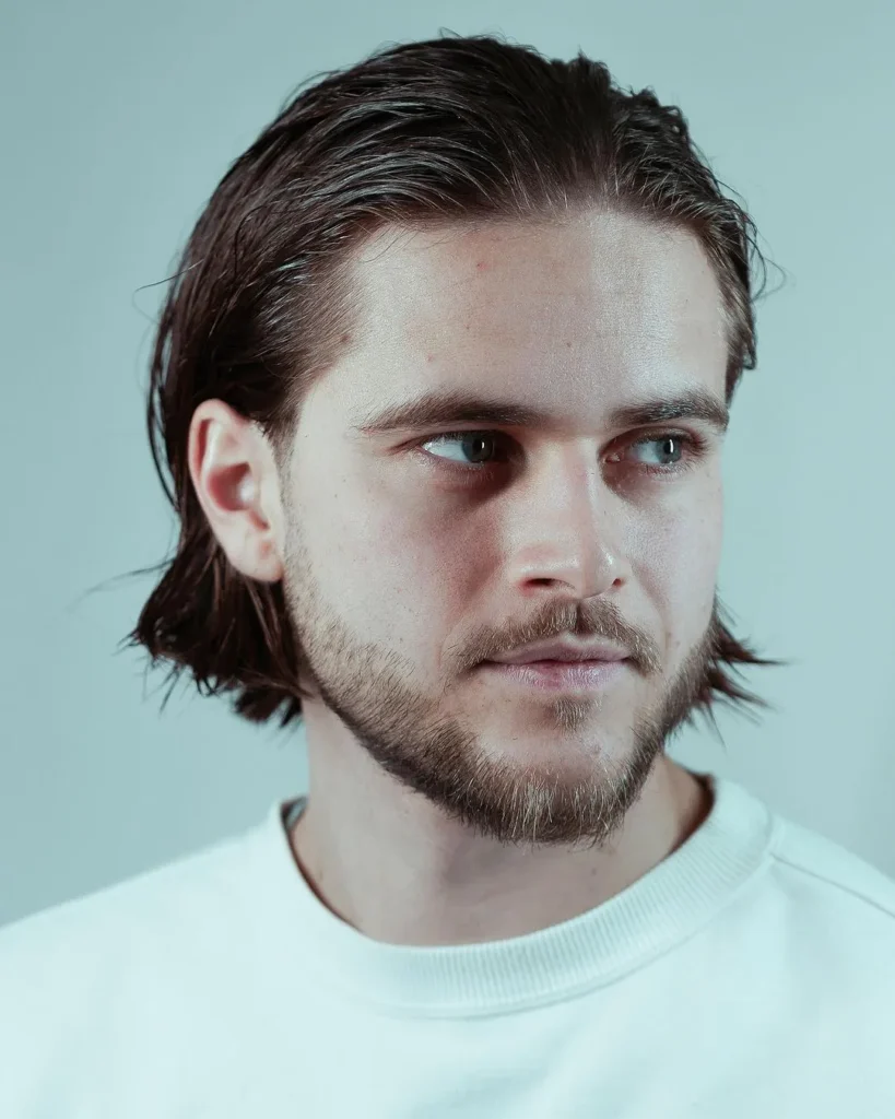 14 Trendy Long Haircuts for Men: Elevate Your Look with Style and Substance 5 16 slick back for medium straight hair