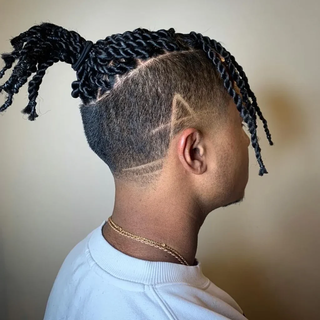 14 Stunning Twist Styles for Modern Black Men: Versatile Looks for a Confident Identity 13 17 men bun with rope twists and undercut design