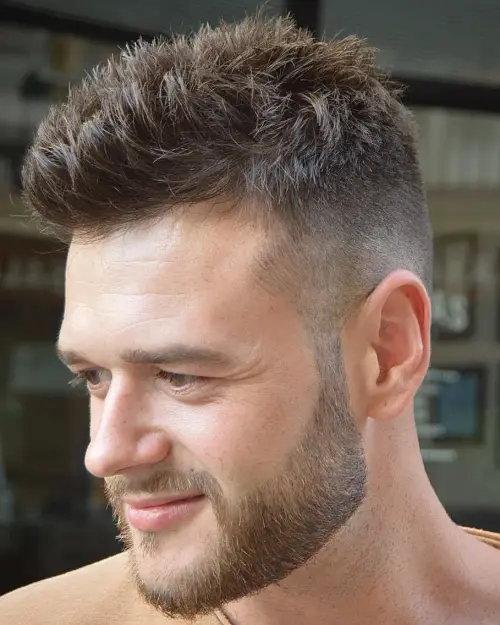 18 Modern Punk Hairstyles: Edgy Looks with a Contemporary Twist 14 2 half shaved mens spiky haircut