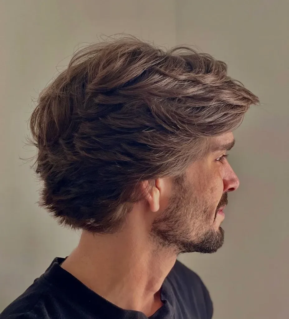 14 Trendy Long Haircuts for Men: Elevate Your Look with Style and Substance 10 2 side swept layered surfer haircut for men