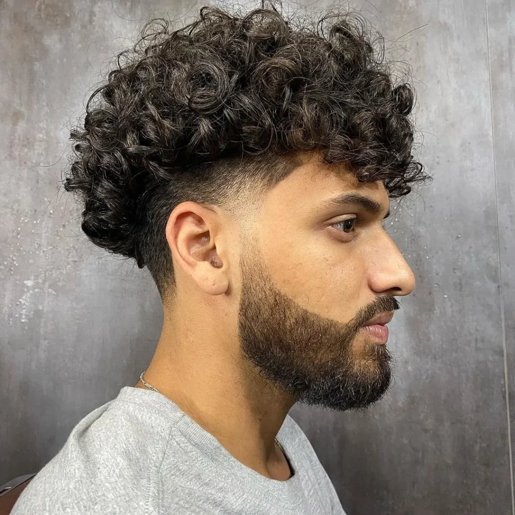 14 Bold Hairstyles for Men with Red Hair: Confident Cuts That Stand Out 15 34 longer thick curly hair with mid disconnected undercut