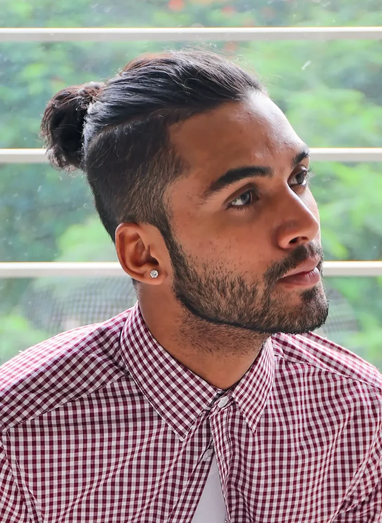 14 Trendy Long Haircuts for Men: Elevate Your Look with Style and Substance 4 34 slicked back cut with undercut