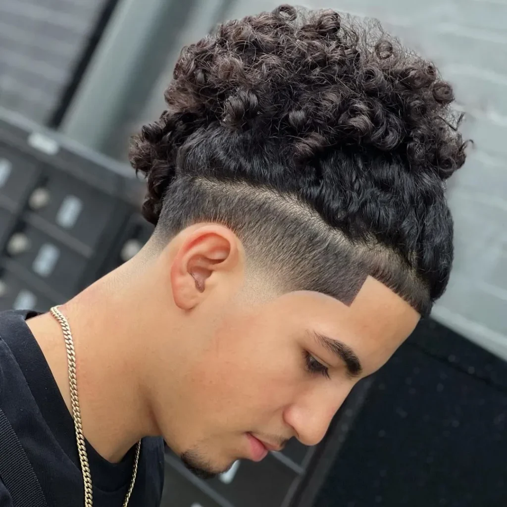 15 Natural Curly Styles: Embrace Texture with Confidence and Elegance 6 5 male long curly hair gathered in pineapple puff