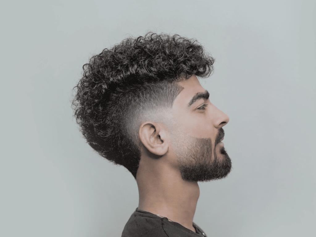 8 Cool Surfer Haircuts for Boys: Effortless Style Inspired by the Ocean 4 Burst Taper