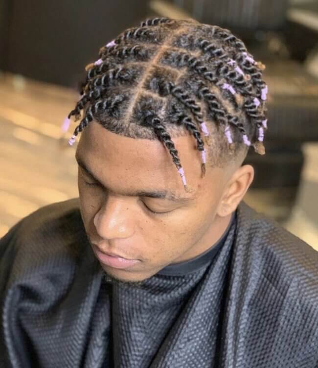 21 Stylish Twist Hairstyles for Black Men: A Definitive Grooming Guide 2 High Top Fade with Twists for men styles 650x752 1