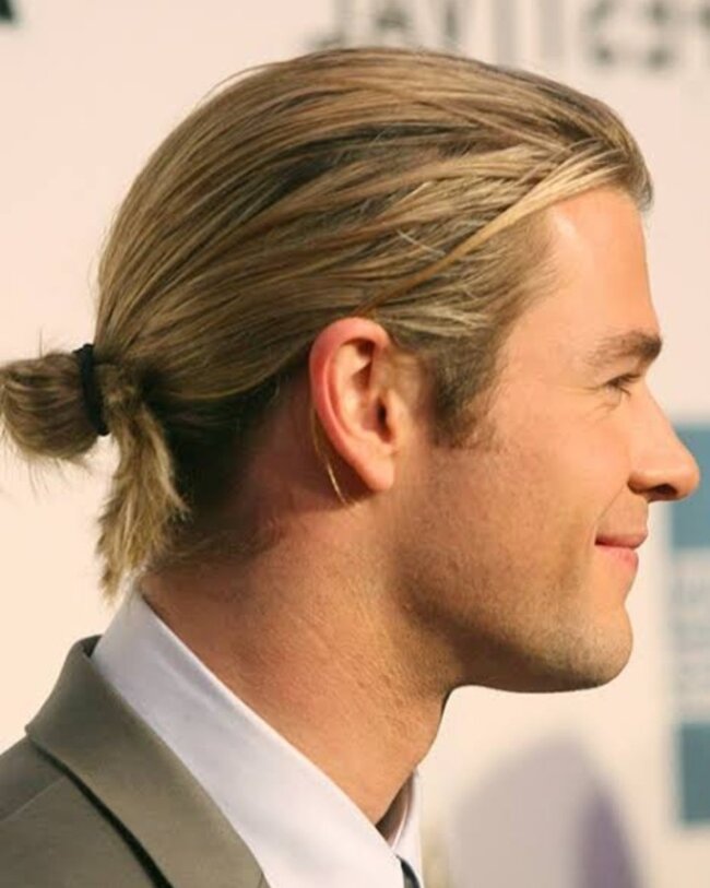 21 Stylish Twist Hairstyles for Black Men: A Definitive Grooming Guide 17 Low Knot Bun Hairstyle 650x813 1