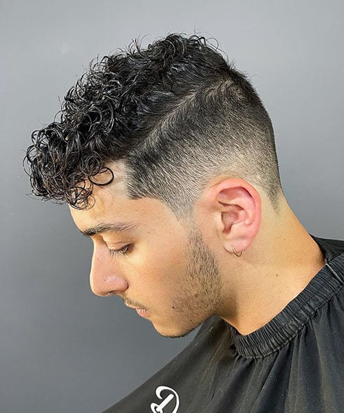 14 Iconic Afro Inspired Cuts: A Celebration of Heritage and Style 9 Low Taper Fade with Thick Curls