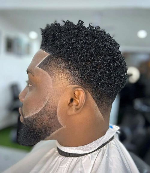 17 Soccer Hairstyles: Iconic Cuts That Score On and Off the Pitch 9 Low Temp Fade with Thick Medium Curls
