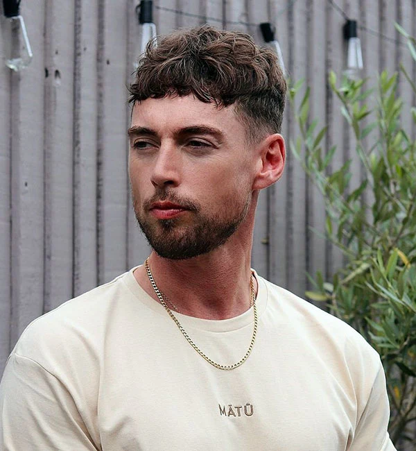 8 Cool Surfer Haircuts for Boys: Effortless Style Inspired by the Ocean 5 Messy French Crop with Low Taper Fade