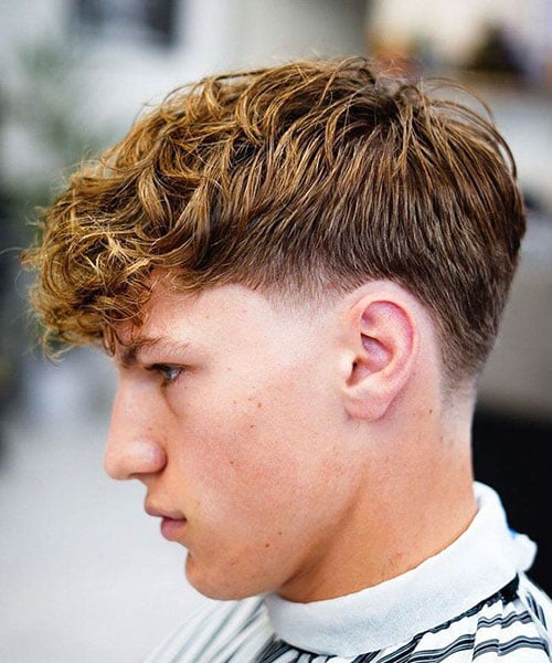 15 Blonde Hair Styles for Men: Classic to Contemporary Trends 9 Short Textured Hair with Low Taper Fade
