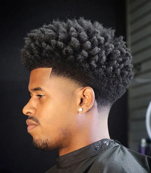 13 Afro Fade Variations: A Stylish Evolution of Black Men’s Hair 2 Sponged Long Afro Fade