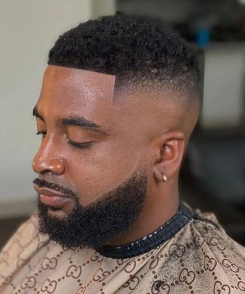 20 Stylish Hispanic Hairstyles for Men: A Complete Grooming Guide 7 Swanky Malone Buzz Cut Afro
