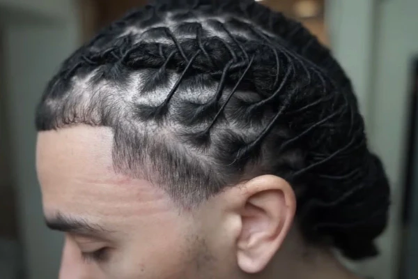 11 Creative Dread Styles for Black Men: A Bold Expression of Culture and Style 5 Taper fade with dreads