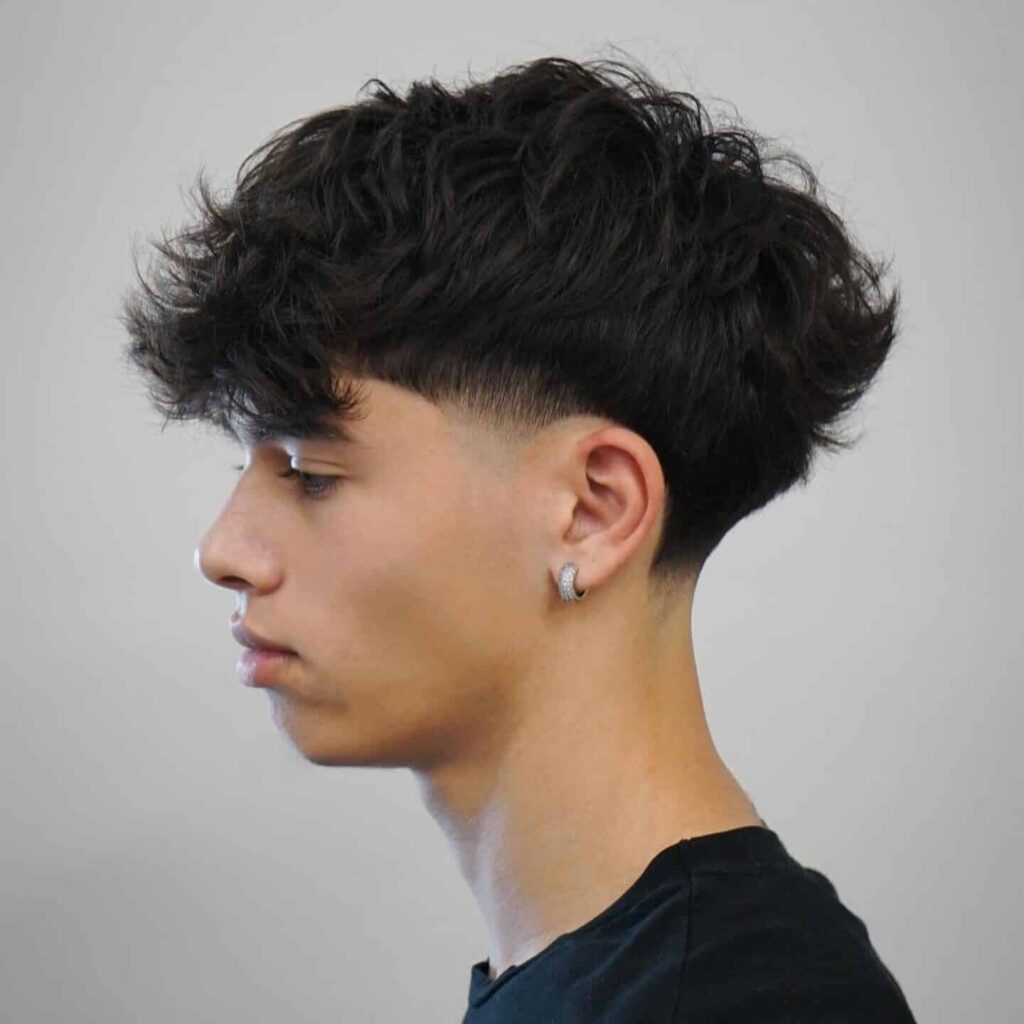 20 Stylish Medium Length Haircuts for Men: Refined Looks for the Modern Gentleman 12 blowout taper textured fringe edited