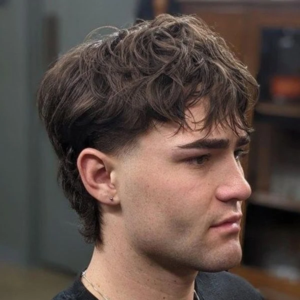 18 Effortless Summer Hairstyles: Stay Cool and Stylish 19 buzzed sides wolf cut