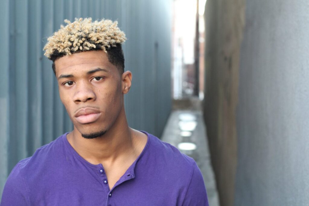 14 Fresh Haircut Ideas for Men with Curly Hair: Elevate Your Look with Texture and Style 5 curly hair undercut blonde