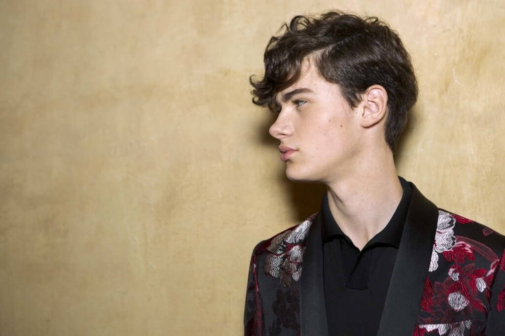 14 Fresh Haircut Ideas for Men with Curly Hair: Elevate Your Look with Texture and Style 3 curly quiff hair side1