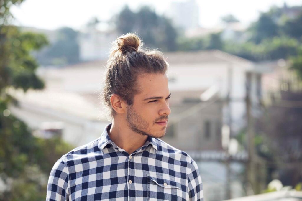 14 Bold Hairstyles for Men with Red Hair: Confident Cuts That Stand Out 13 man bun finished side shothp