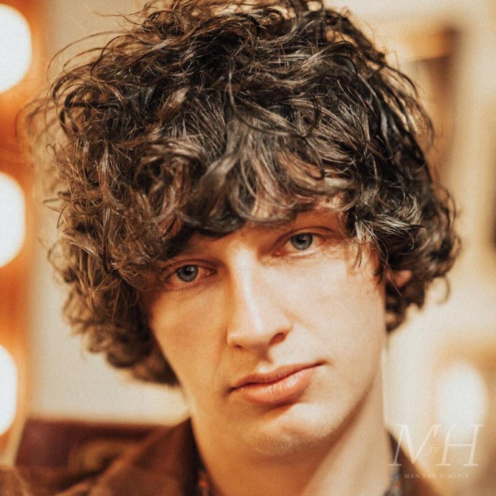 15 Natural Curly Styles: Embrace Texture with Confidence and Elegance 17 mens round graduation square layer how to hairstyle johnny baba man for himself mfh8 1