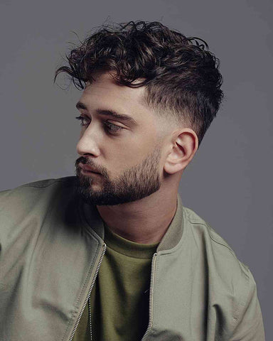 18 Low Maintenance Haircuts for Men Over 50: Timeless Style Meets Effortless Grooming 18 messy curly hair and taper fade for