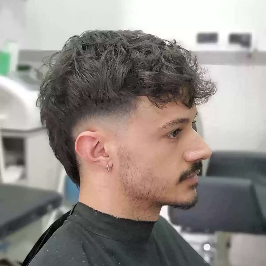 17 Soccer Hairstyles: Iconic Cuts That Score On and Off the Pitch 17 mid taper fade with textured top and bangs for guys 1
