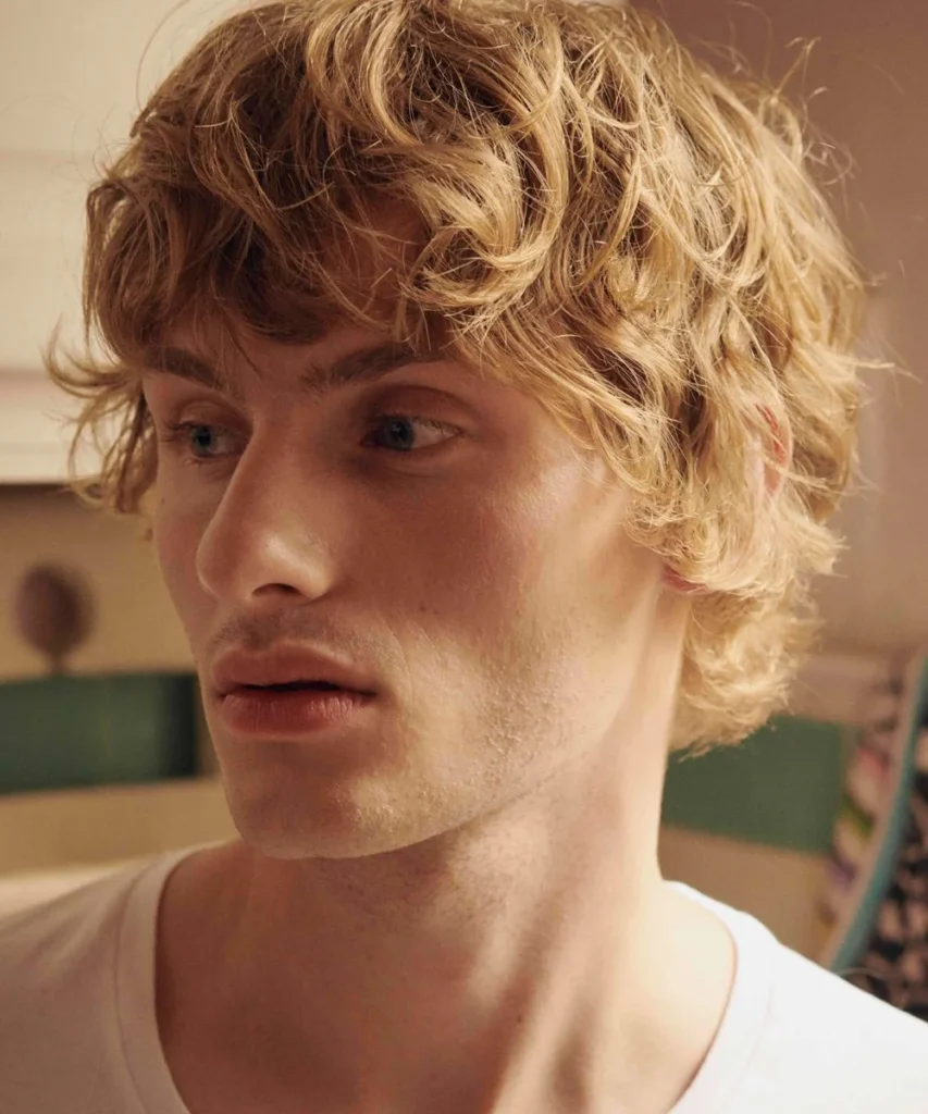 8 Cool Surfer Haircuts for Boys: Effortless Style Inspired by the Ocean 7 midlengthmenshairstyles11