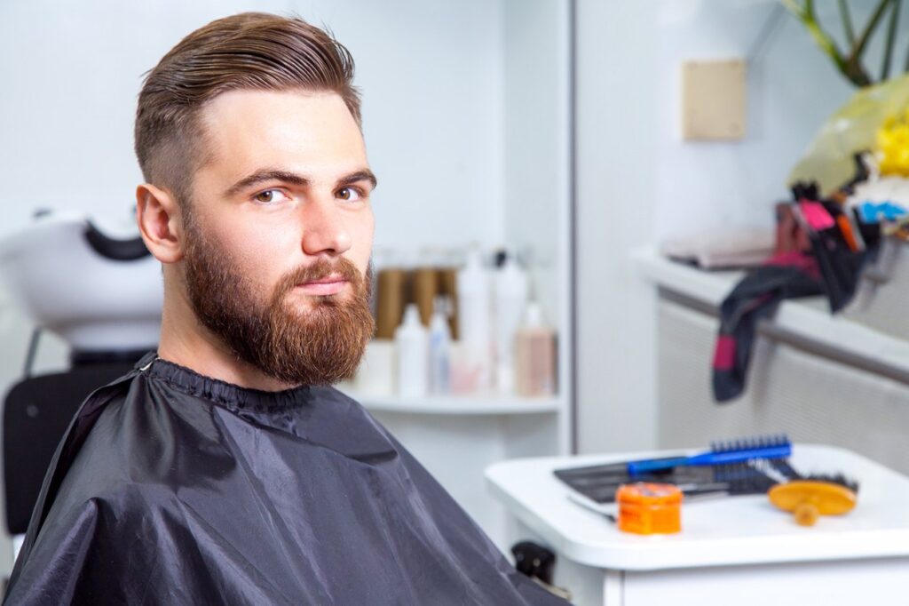 11 Modern Undone Pompadour Ideas: Effortless Volume with a Contemporary Twist 9 side swept undercut barber