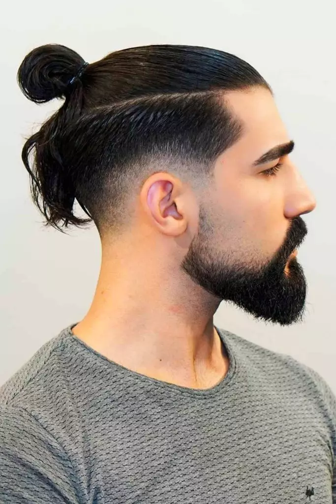 14 Trendy Long Haircuts for Men: Elevate Your Look with Style and Substance 11 taper fade haircut low man bun undercut 683x1024 1