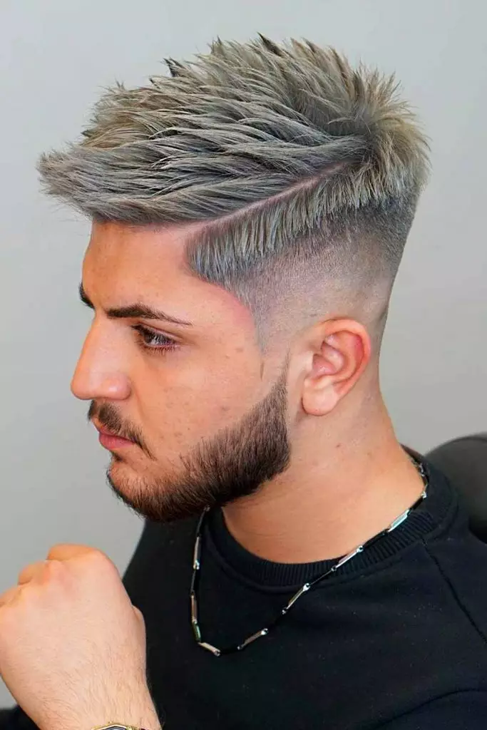 17 Soccer Hairstyles: Iconic Cuts That Score On and Off the Pitch 12 undercut fade messy spiky silver 683x1024 1