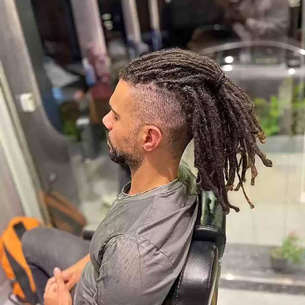 17 Dread Hairstyles: Timeless Styles with Bold Expression 4 undercut with long freeform dreads for gentlemen