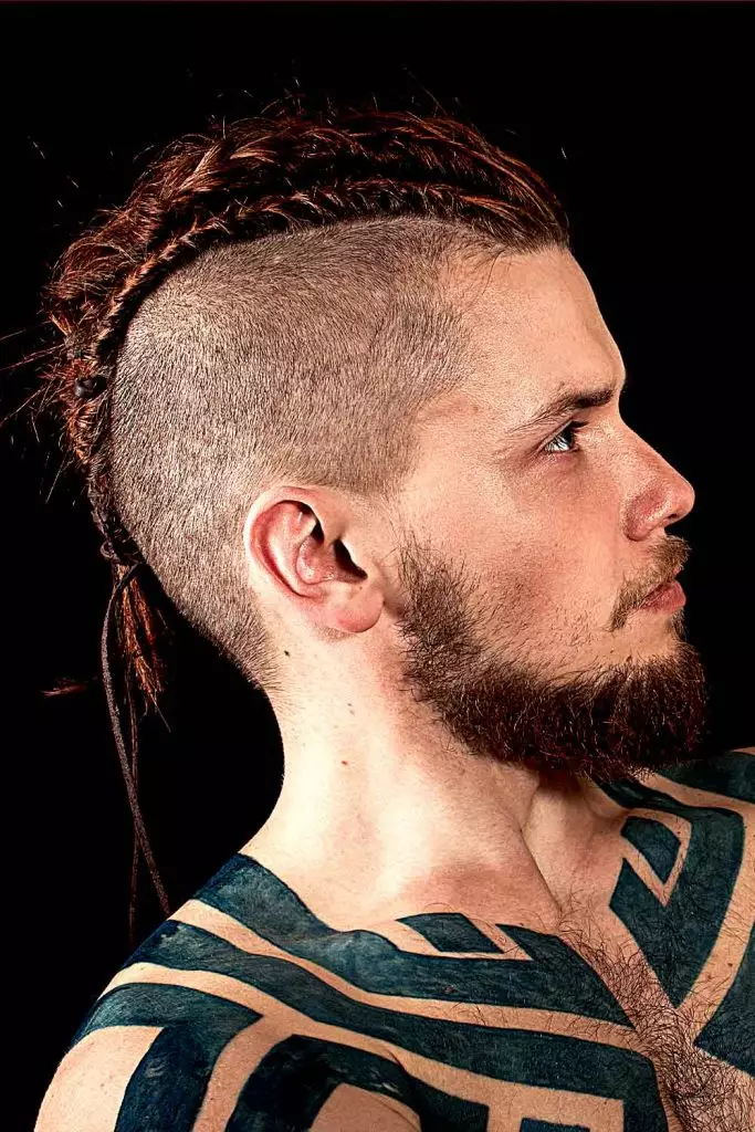 21 Stylish Twist Hairstyles for Black Men: A Definitive Grooming Guide 9 viking braids undercut mohawk twist cornrows 683x1024 1