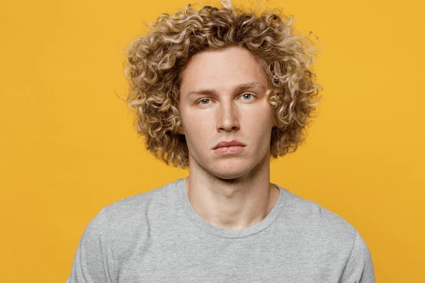 15 Blonde Hair Styles for Men: Classic to Contemporary Trends 12 young cute calm cool blond 600nw 2180414673