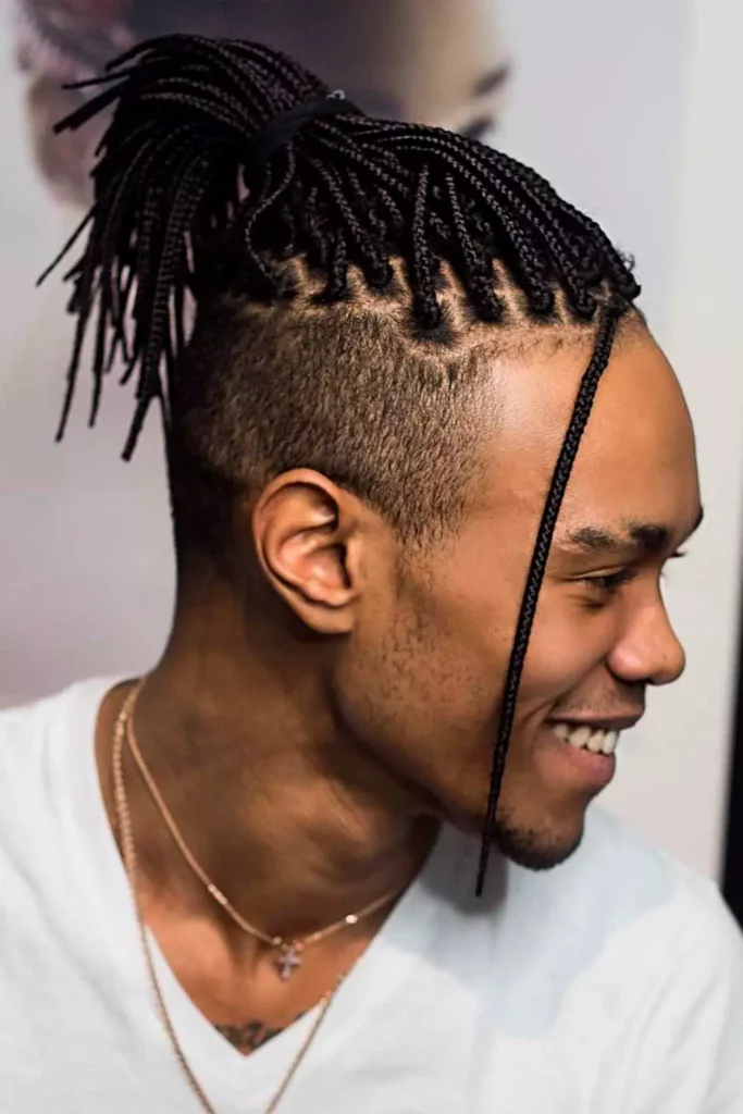 17 Braided Hairstyles for Men: Style, Identity, and Expression 3 box braids men long thin afro undercut 1