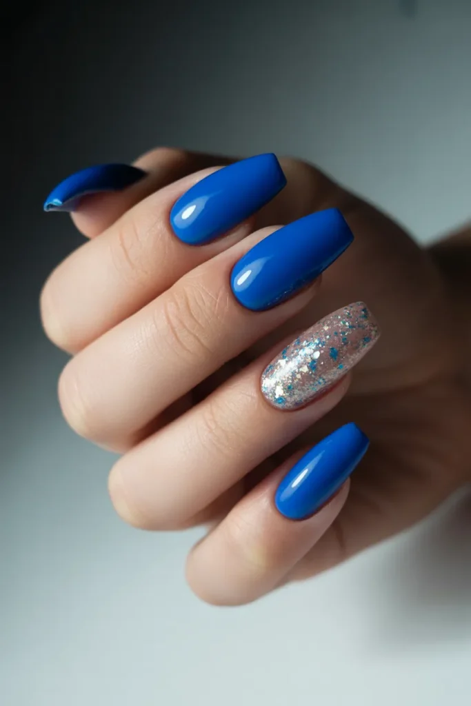 blue glossy nails with one glitter accen g7SeUiOwSh gpeRZ432mzQ GyIL9OOWSISiAY6NbgA47A