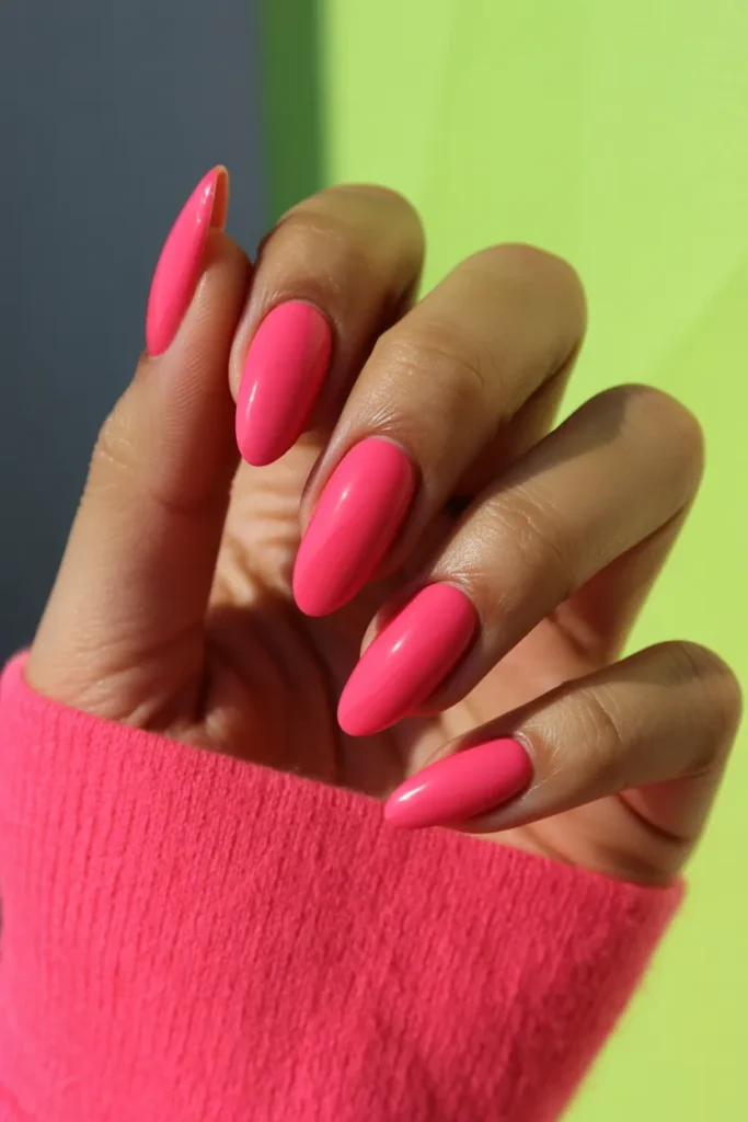 bold hot pink manicure on almond shaped h6lCIBgtQiuhIekGjGX7yw 6FUbuAhTe6cE4gOMgoc6A