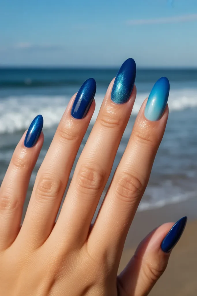 18 Vacation Nails: The Ultimate Guide to Stylish Holiday Manicures 3 close up of nails with ocean blue ombre lX7YWfp T0S7xZR7f9kbLA jVvt1AqjT66MAGgaBncktg 1