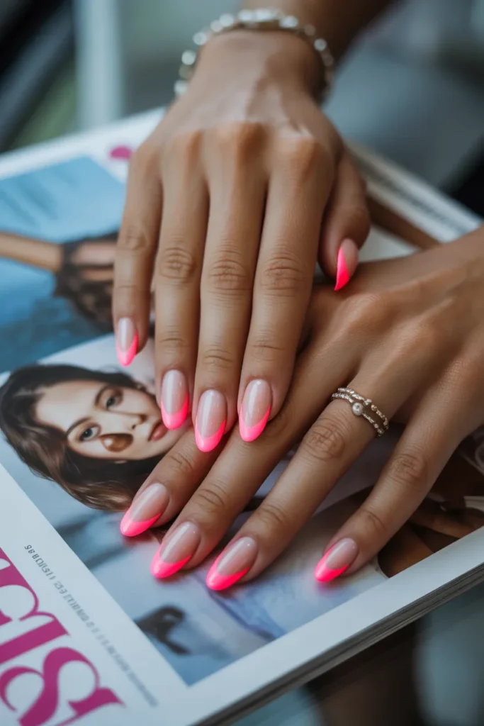 french manicure with neon pink tips on a ySmJfJ0ORzWeNKy7qu0Scw 6Osuub53SlGRFSZmmnAIaA
