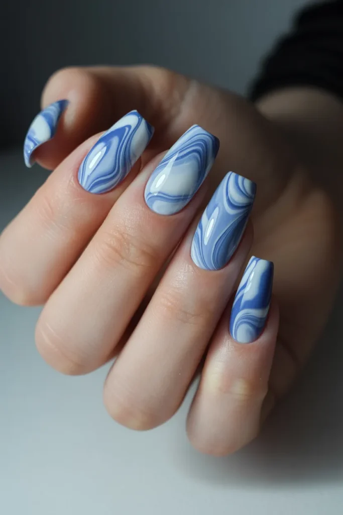 marble nail art with swirling blue and w C afwbXQ5Gs173s4TZ92Q si0bSO2ySiikjiFLUhOPvg