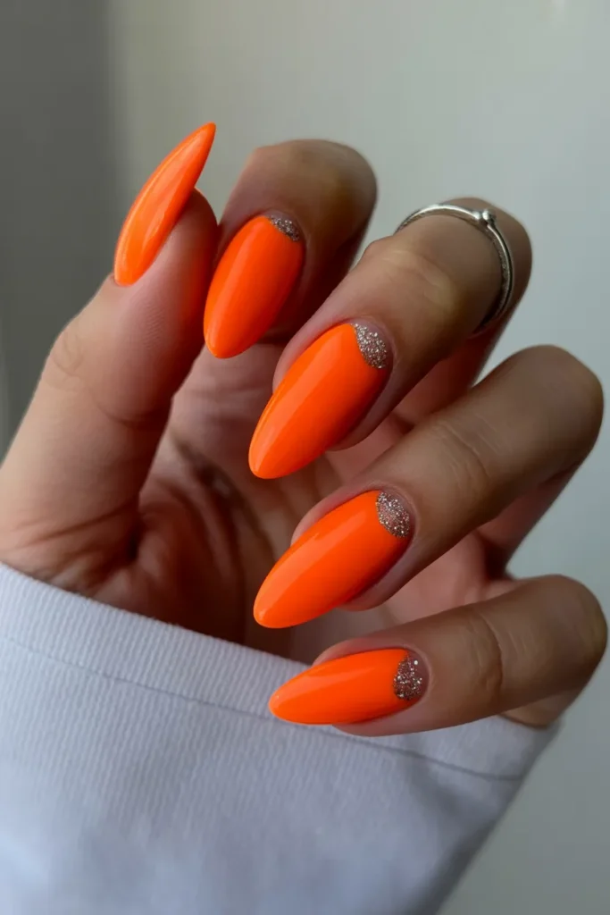 vibrant neon orange almond shaped nails ftg0CC7kS02wpsVCPoQYfA XZnt1cYtTmqESwiTk7KDGw