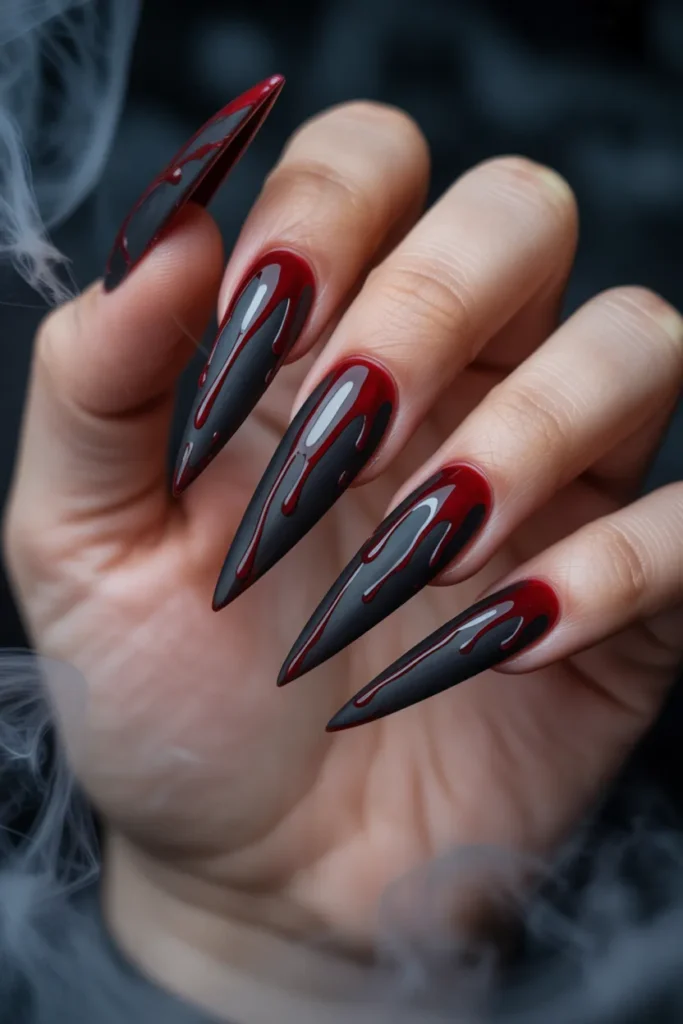 14 Halloween Nails Acrylic Ideas That Are Bold, Spooky & Stylish 3 dramatic beauty close up of long stilett UPvUqczvQA JMt0GxNrTjw 0OL5lhtjTiyUPNcSm8DyFw cover