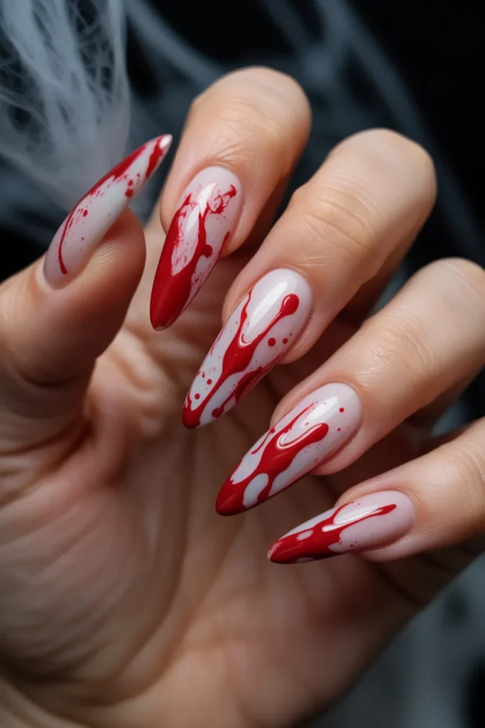 14 Halloween Nails Acrylic Ideas That Are Bold, Spooky & Stylish 5 long almond shaped acrylic nails with mi lSgt6g 6SAaE1cBhO oQgg xzNfkHSSbWyKmFu3fjmeg cover